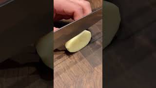 Slicing raw potatoes with a sashimi knife [upl. by Delphinia]